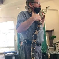 Colonial Gardens Gracious Retirement Living Hawthorn Senior Independent Living in Beverly, Massachusetts resident with a snake