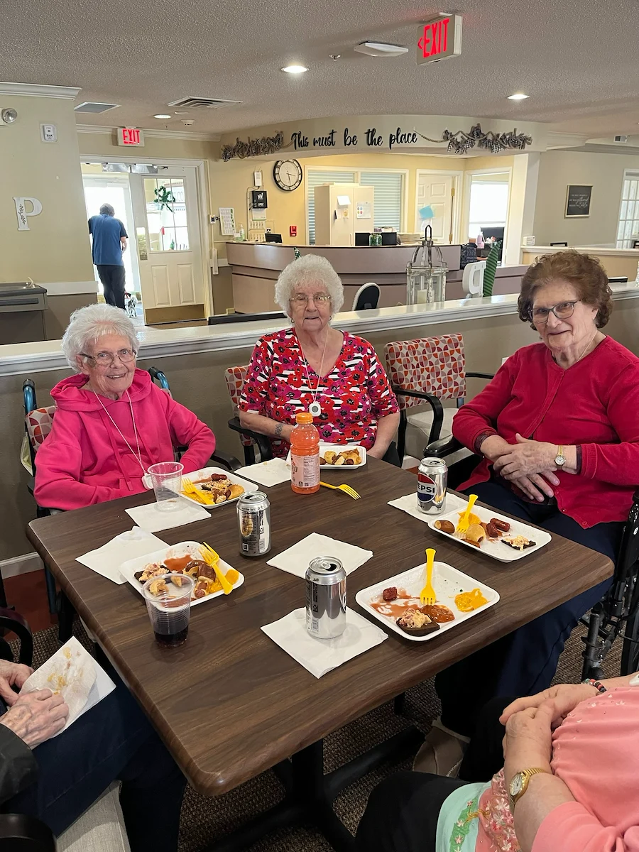 Pathfinder Senior Living in Fremont, NE, residents enjoy dining together and socializing