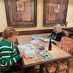 The Stafford Senior Living in Lake Oswego, Oregon residents doing arts and crafts