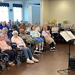 The Seasons@Alexandria (Assisted Living) residents enjoying listening to music