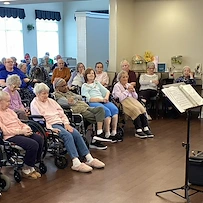 The Seasons@Alexandria (Assisted Living) residents enjoying listening to music