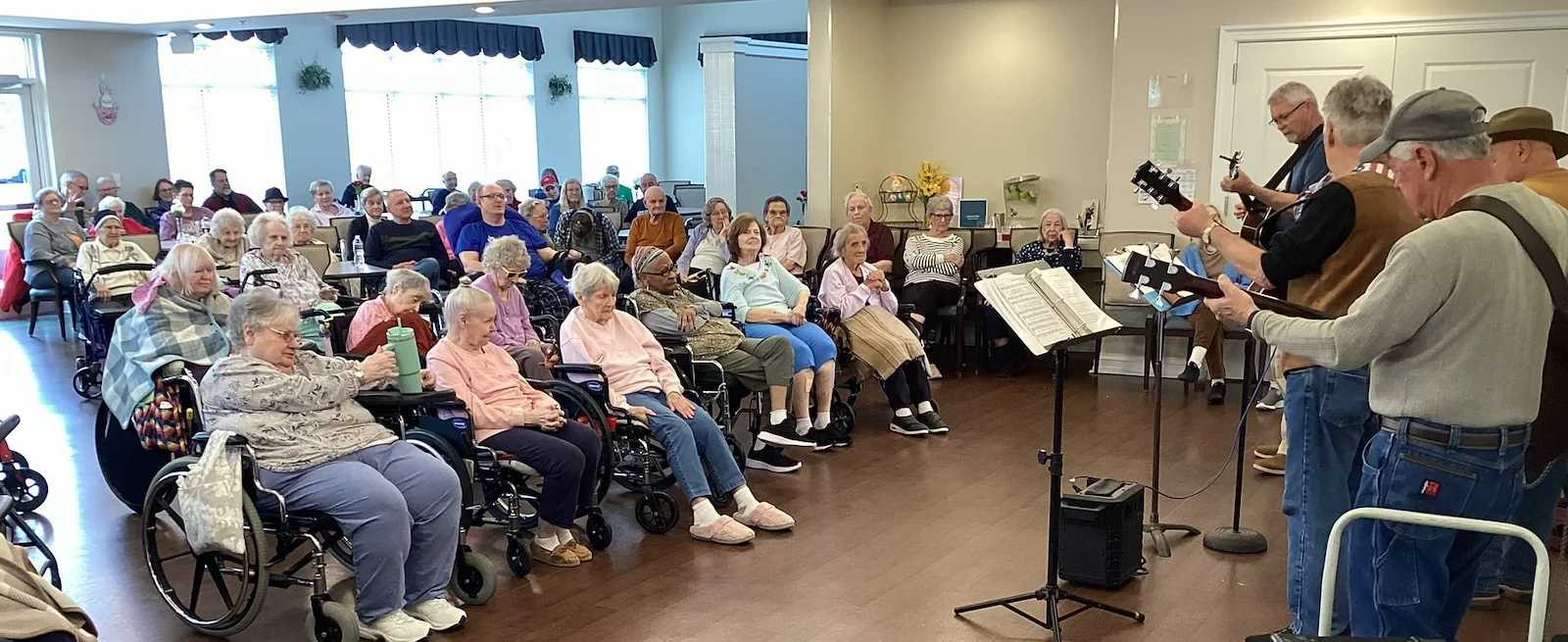 The Seasons@Alexandria (Assisted Living) residents enjoying listening to music