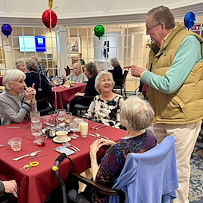 The Forum at The Crossing residents enjoy a celebration