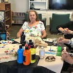Olympus Ranch Gracious Retirement Living Hawthorn Senior Independent Living in Murray, Utah residents doing arts and crafts