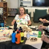 Olympus Ranch Gracious Retirement Living Hawthorn Senior Independent Living in Murray, Utah residents doing arts and crafts