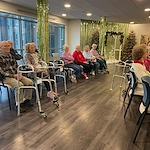 Astral at Auburn, senior living community offering independent living, assisted living, and memory care in Auburn, IN, residents enjoy a presentation