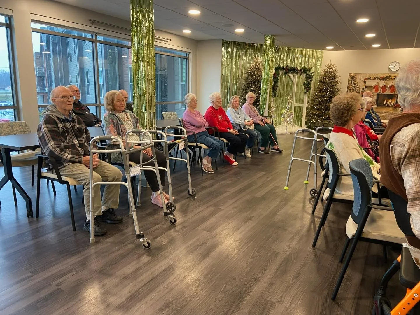 Astral at Auburn, senior living community offering independent living, assisted living, and memory care in Auburn, IN, residents enjoy a presentation