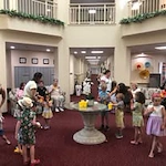 kids having a lemonade stand at Ivy Creek Gracious Retirement Living Hawthorn Senior independent Living in Glen Mills, Pennsylvania