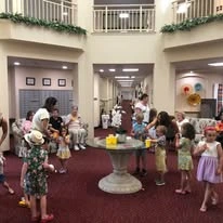 kids having a lemonade stand at Ivy Creek Gracious Retirement Living Hawthorn Senior independent Living in Glen Mills, Pennsylvania