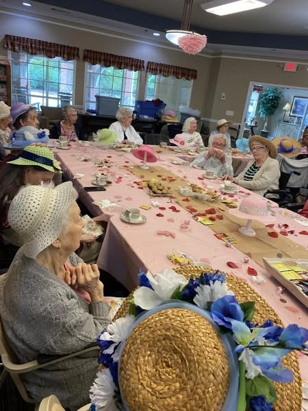 Gaines Park residents enjoying a Mother's Day tea party