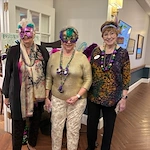 Covenant Living at Inverness in Tulsa, OK, smiling residents having fun during a celebration