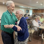 Long House senior living community offering independent living and respite care in Erlanger, KY, residents having fun dancing