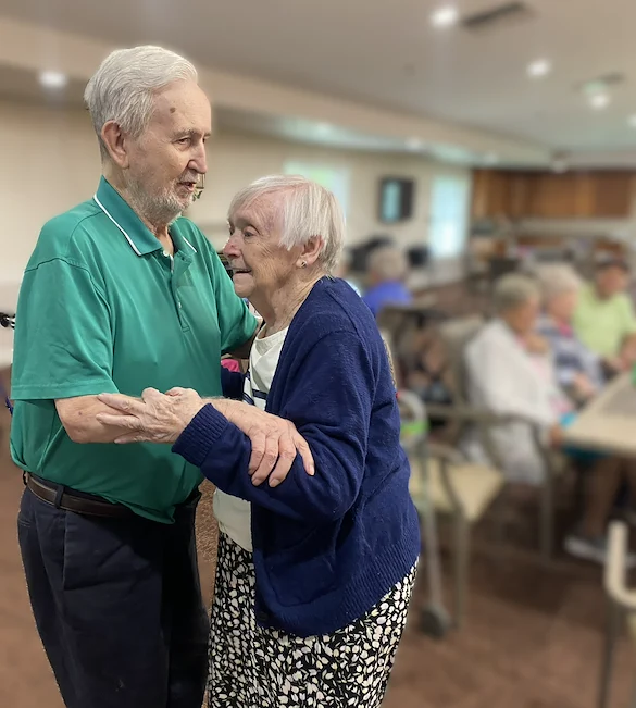 Long House senior living community offering independent living and respite care in Erlanger, KY, residents having fun dancing