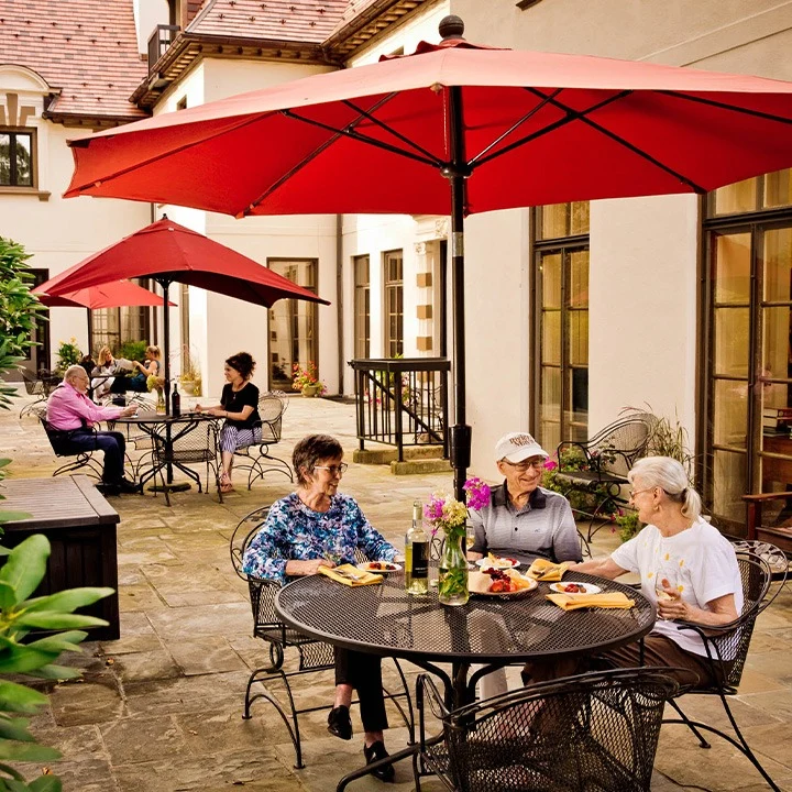 The Mansion at Rosemont Senior Living in Rosemont, PA, residents socializing outside