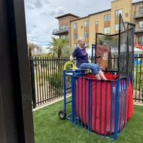 Ovation Sienna Hills Senior Living in Washington, Utah resident in the dunk tank