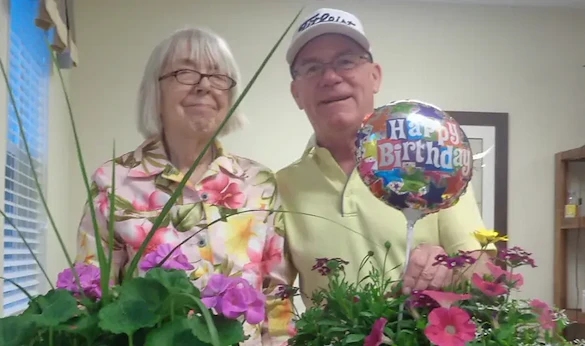 Grace Point Place Assisted Senior Living Memory Care in Oak Lawn, IL residents celebrating a birthday