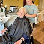 Pomeroy Living Orion resident using beauty salon services