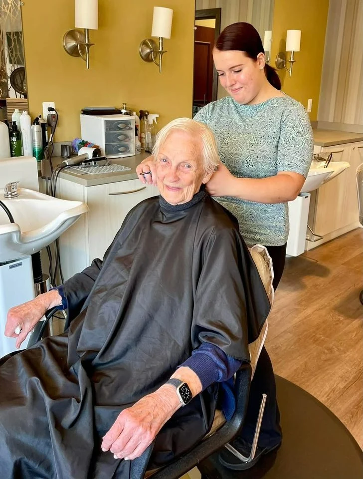 Pomeroy Living Orion resident using beauty salon services