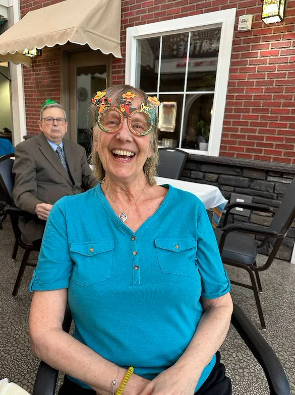 Fieldstone Memory Care of Marysville smiling resident during celebration