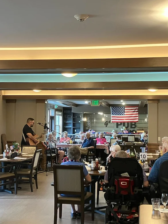 Noel Manor Retirement Living Verona, WI, residents enjoying entertainment