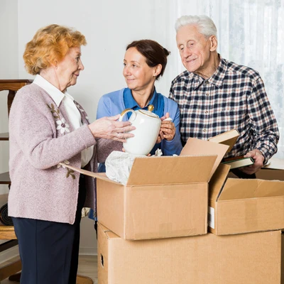 What Families Forget During A Move | seniors and caregiver packing