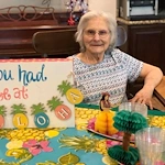 Hawthorne Woods by New Perspective in Washington, PA, smiling resident enjoying a summer celebration
