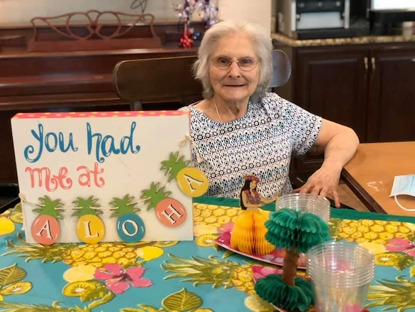 Hawthorne Woods by New Perspective in Washington, PA, smiling resident enjoying a summer celebration