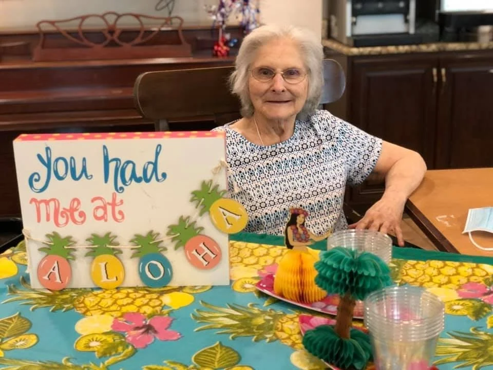 Hawthorne Woods by New Perspective in Washington, PA, smiling resident enjoying a summer celebration