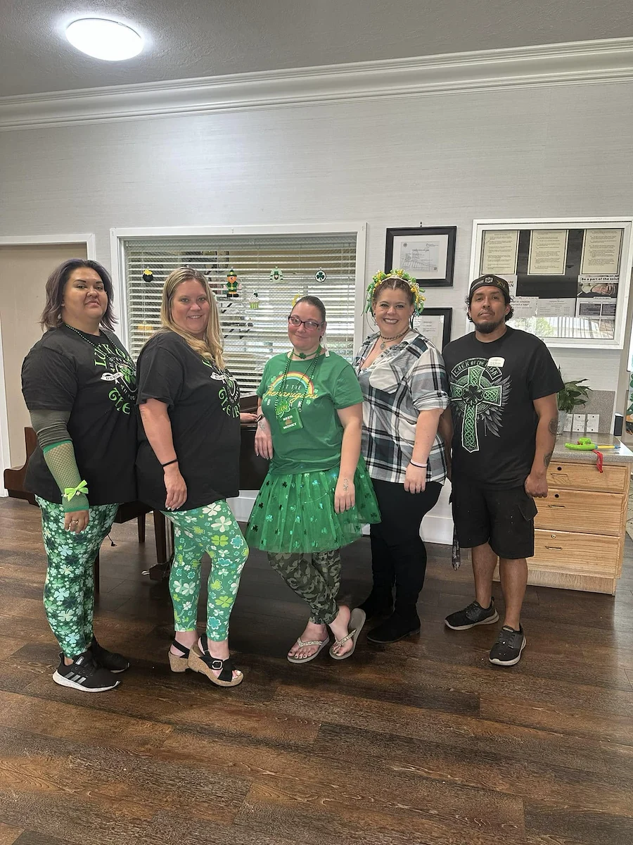 Ridgeview Gardens Assisted Living staff dressed up for st. patrick's day