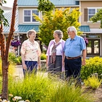 Hillside Senior Living in McMinnville, OR, residents visiting on a walk