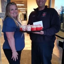 Capitol Ridge Gracious Retirement Living Hawthorn Senior Independent Living in Bristow, Virginia staff with Valentine's Day treats