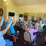 Estrella Estates Gracious Retirement Living Hawthorn Senior Independent Living in Goodyear, Arizona residents at a workout class