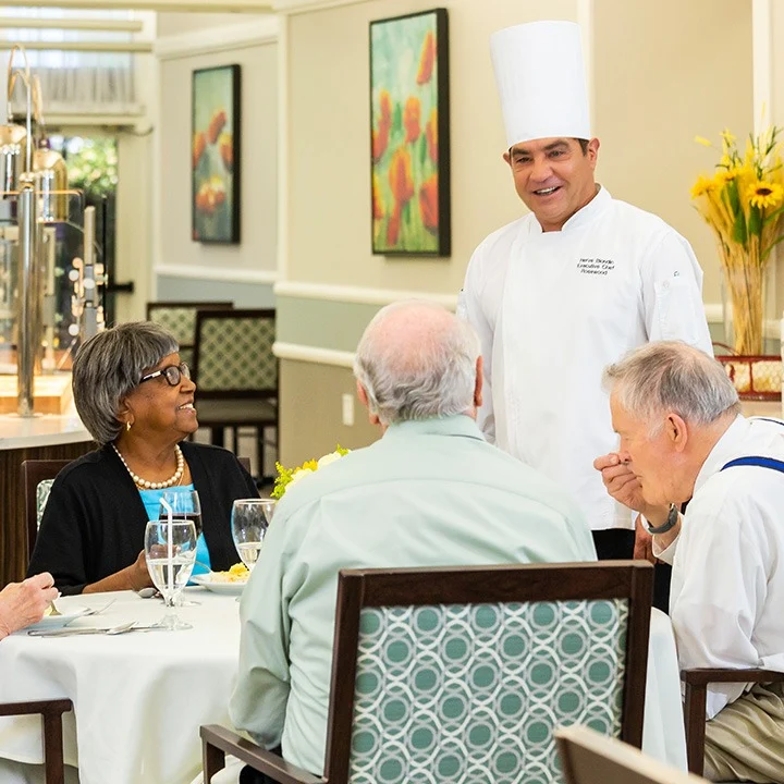 Rosewood Senior Living in Bakersfield, CA, residents dining together and receiving great service