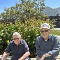 Avamere at Englewood Heights senior living community offering assisted living, memory care, and respite care in Yakima, WA, residents enjoying time together outdoors