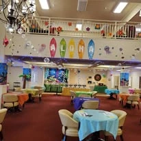 Hawaiian themed party at Magnolia Heights Gracious Retirement Living Hawthorn Senior Independent Living in Franklin, Massachusetts