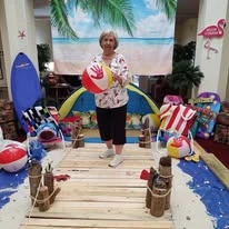 Summerville Estates Gracious Retirement Living Hawthorn Senior Independent Living in Summerville, South Carolina resident at a beach party