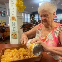 Southern Pines Gracious Retirement Living Hawthorn Senior Independent Living in Southern Pines, North Carolina resident baking