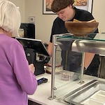 Buying a treat at the bistro