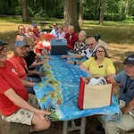 Ivy Creek Gracious Retirement Living Hawthorn Senior independent Living in Glen Mills, Pennsylvania residents having a picnic outside