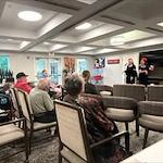 Avamere at Sherwood Assisted Senior Living in Oregon residents watching entertainment