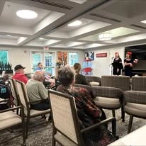 Avamere at Sherwood Assisted Senior Living in Oregon residents watching entertainment