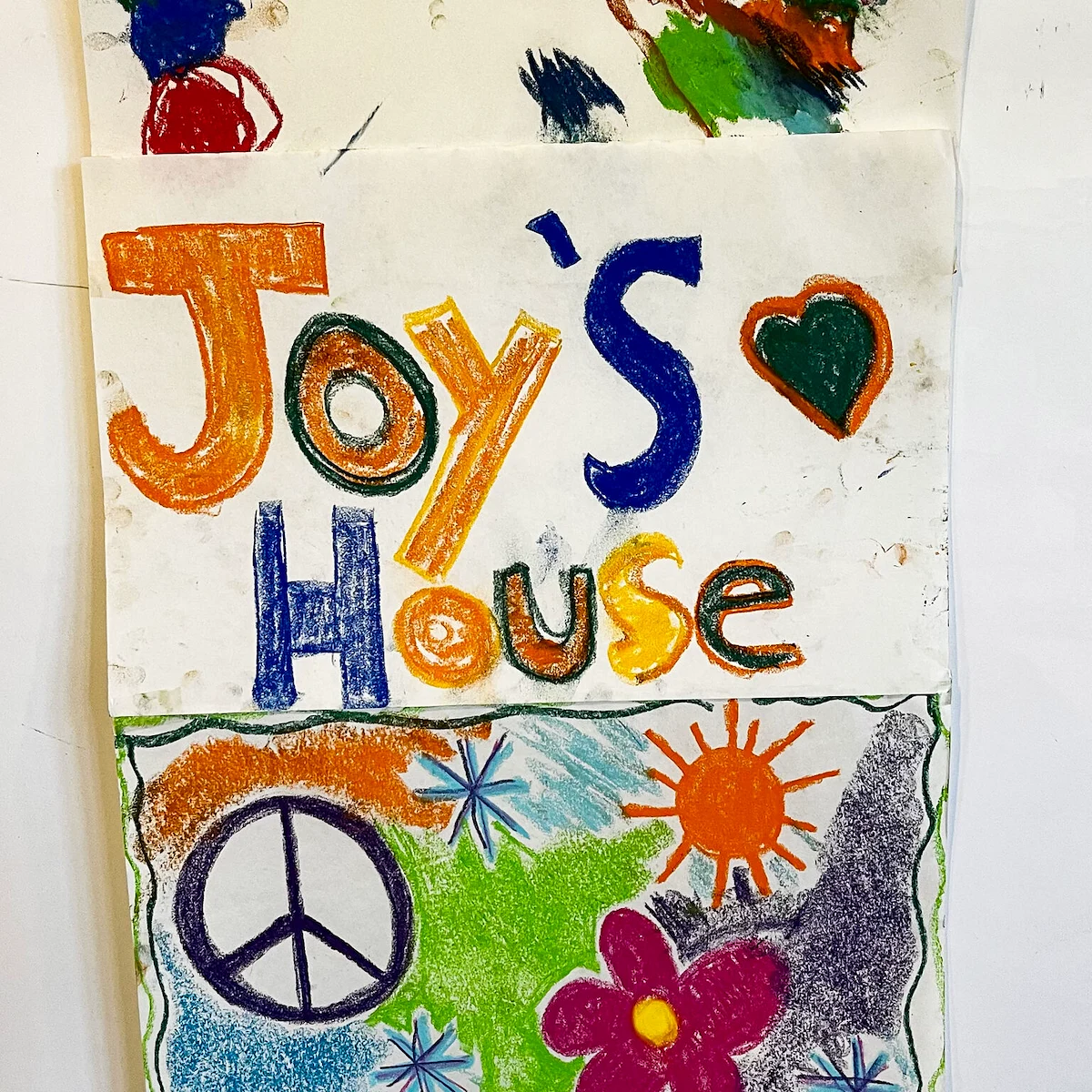 hand drawn picture that says "Joy's House"