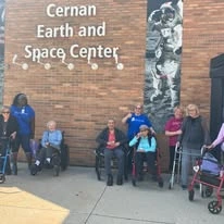 Ascension Living Bethlehem Woods Village senior living community offering independent living, assisted living, and memory care in La Grange Park, IL, residents on an outing to the Cernan Earth and Space Center