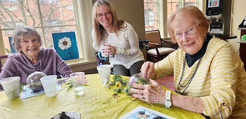 Mallard Cove Senior Living in Cincinnati, OH, resident engagement activity - planting flowers