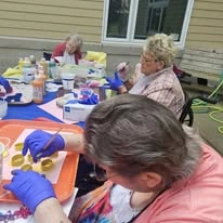 Ascension Living Lakeshore at Siena, assisted living and memory care, Racine, WI, residents painting outside
