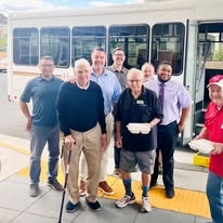 residents getting off the transportation bus at Hessler Heights Gracious Retirement Living Hawthorn Senior Independent Living in Leesburg, Virginia