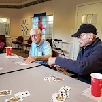 Hawthorne Woods by New Perspective in Washington, PA, residents playing cards and socializing