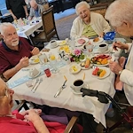 Addolorata Villa, continuing care retirement community offering independent living, assisted living, and memory care in Wheeling, IL, residents enjoying dining together