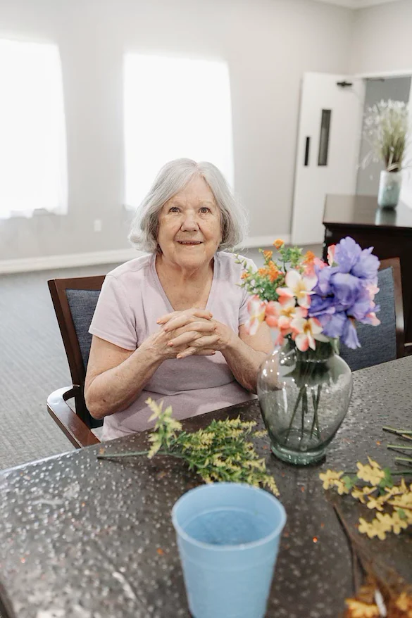 Senior participating in floral activity