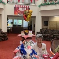 Somerset Lodge Gracious Retirement Living Hawthorn Senior Independent Living in Gladstone, Oregon residents at a BBQ party